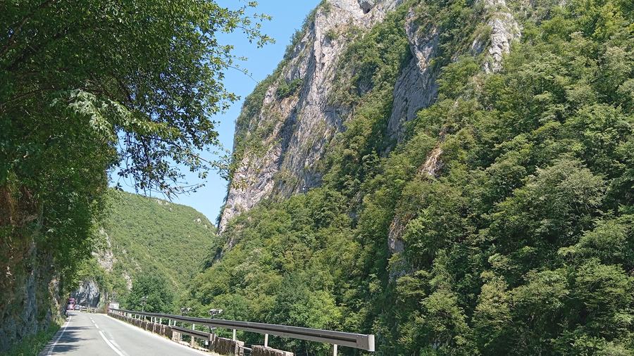 Limestone cliffs rising above the road through the Vrbas canyon